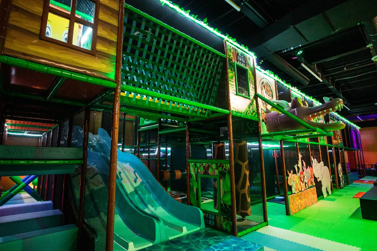 The multi-level indoor play structure at Recess