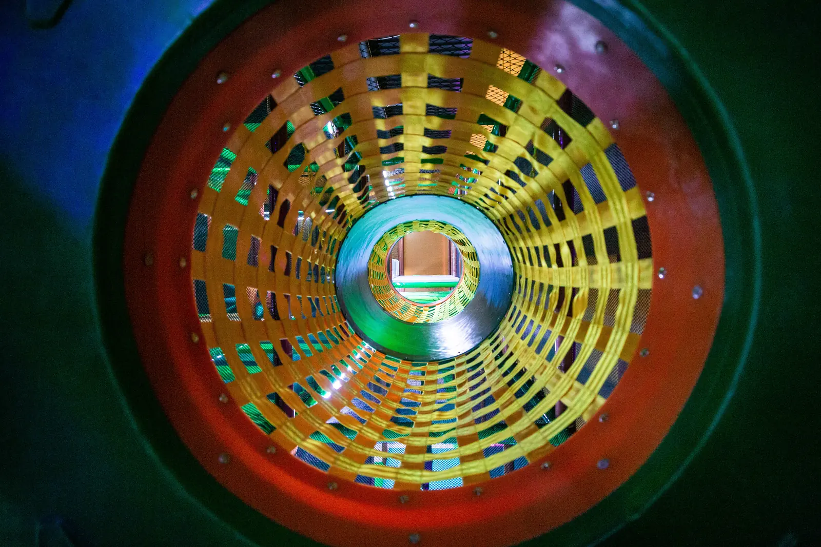A rolling barrel tunnel inside the play area