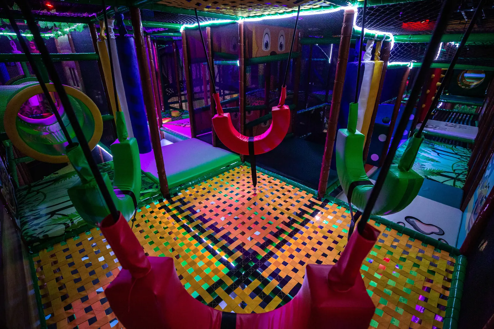 The indoor swing zone with soft seats